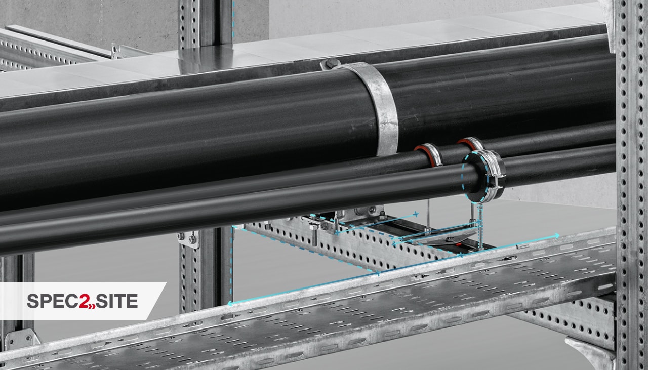 A variety of pipes of different sizes is shown installed on a modular support system