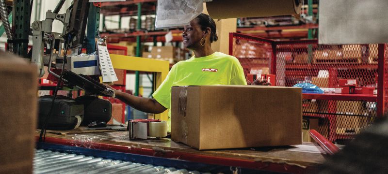 Cropped image of Woman at Hilti packing station