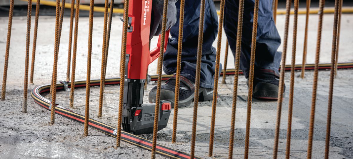 Installing injection hose with powder-actuated tool DX 6 MX and X-FB element