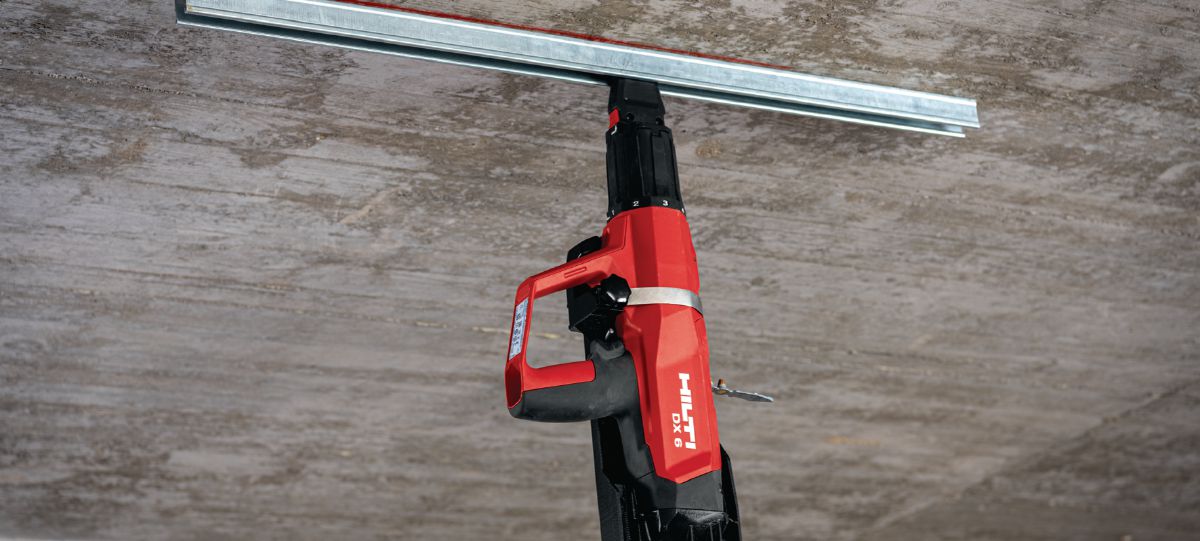 Fastening installation channel with powder-actuated tool DX 6-F8 pole tool.