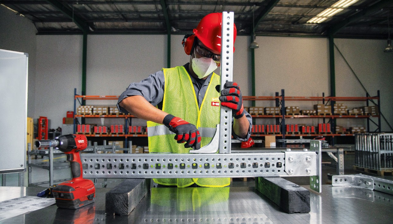 Worker assembling a prefab order