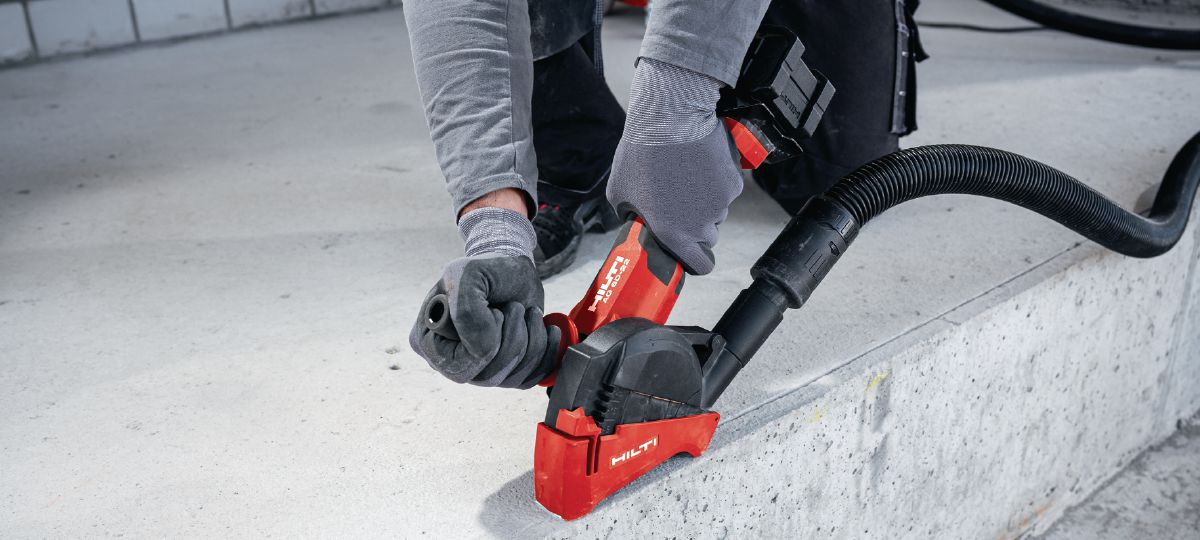 Cordless angle grinder AG 6D-22 concrete cutting application.