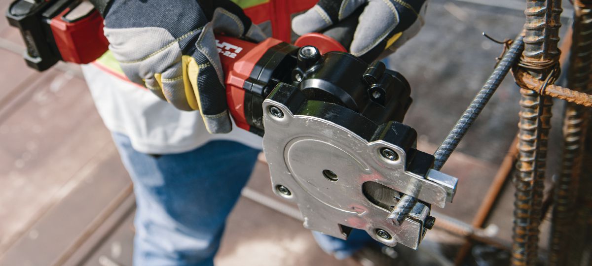 Cropped image of a real customer using the NRC 6-22 rebar cutting tool. Produced by HNA, September 2023, Dallas, TX. 